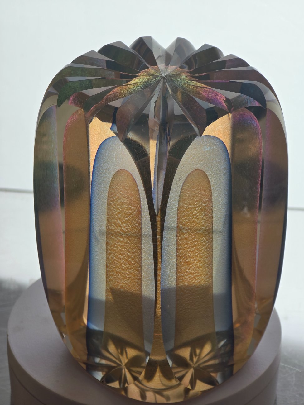 Art glass veiled had cut sculpture