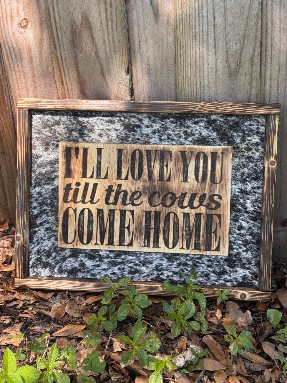 Cowhide sign - cows come home